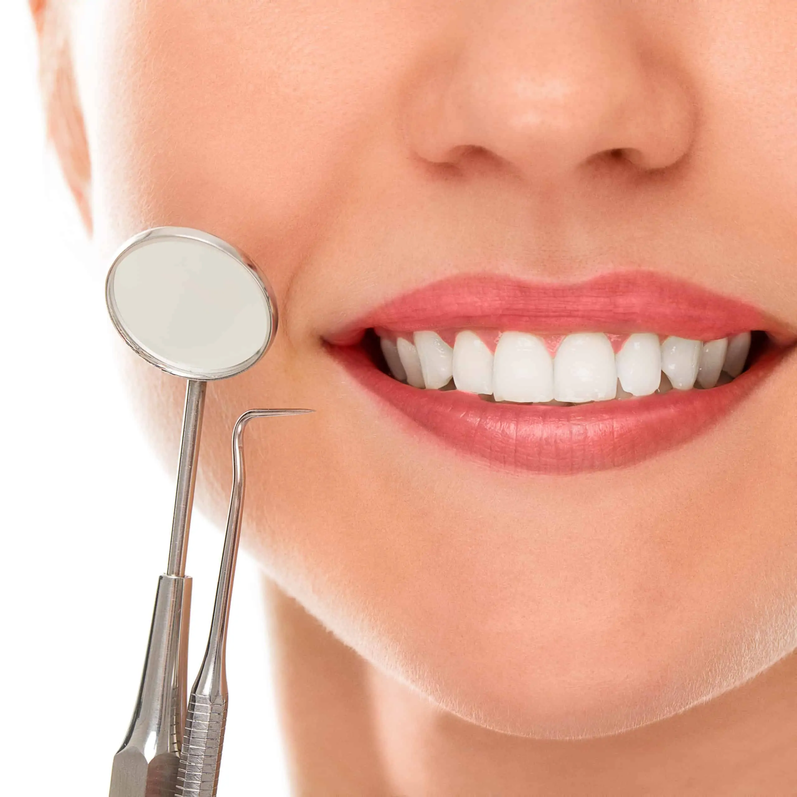 White smile with dental instruments